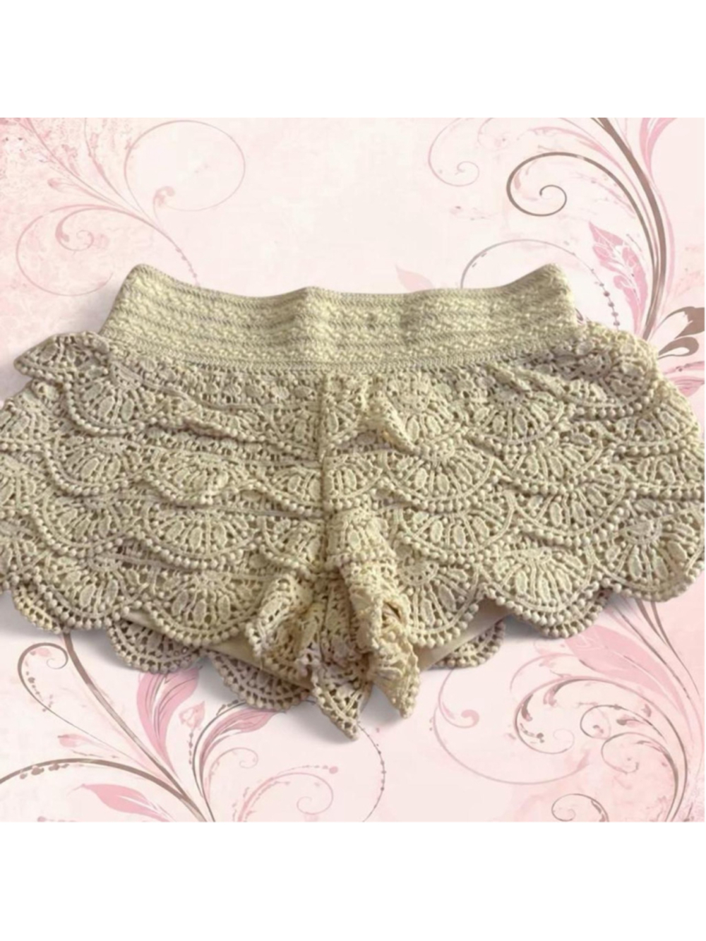Cream shorts with ruffles detail
